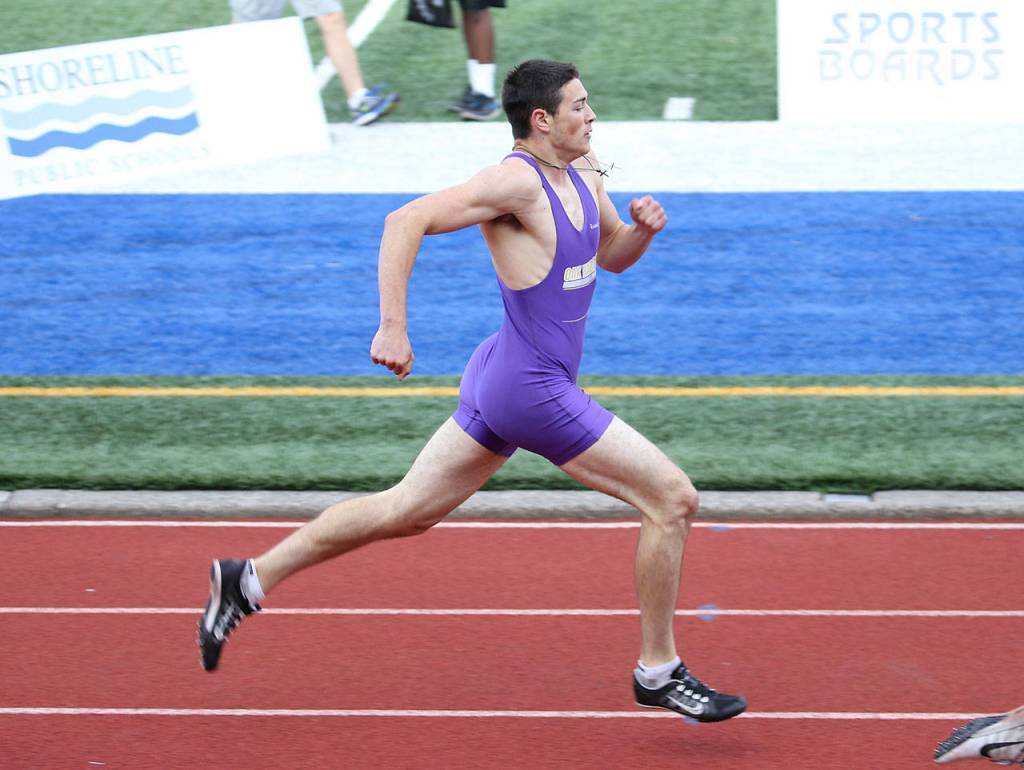 Mac Nuanez takes third in the 400 meters, good for a spot in the state meet.(Photo by John Fisken)