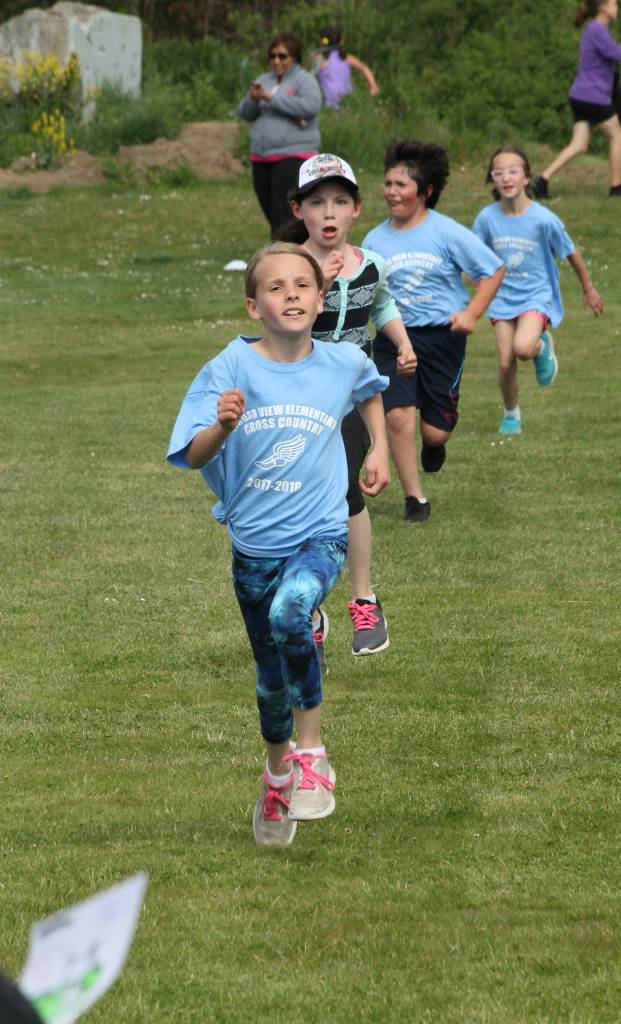 Girls sprint to the finish in last weeks race at Fort Nugent Park.(Photo by Jim Waller/Whidbey News-Times)