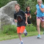 Oak Harbor Intermediates Landon Vandergrifft leads Addisen Boyer (blue shirt) and Jazmin Hernandez.(Photo by Jim Waller/Whidbey News-Times)