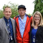 Recent drug court graduate Conrad Standinger, center, stands with his case manager Ken Delano and Carolyn Pence, drug court coordinator. His accomplishments were recently celebrated by staff and other participants in the program during Island County Drug Court Month. Photo by Laura Guido/Whidbey News Group