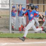 Kaiden Bucholz races home for the Cubs first run. (Photo by Jim Waller/Whidbey News-Times)