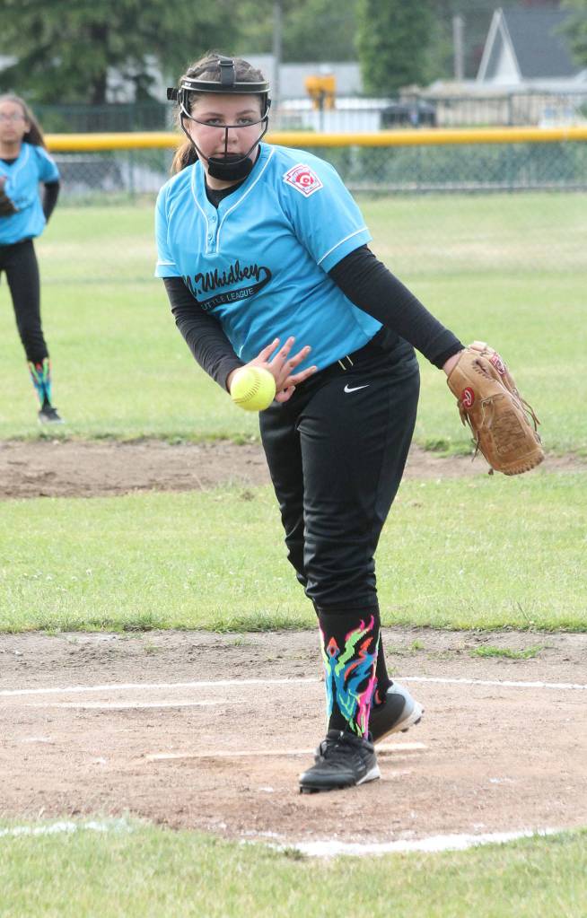 Katie Cantrell tosses a pitch for the Blue Dragons.(Photo by Jim Waller/Whidbey News-Times)