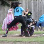 Scarlett Nations slides under the tag of Blue Dragon third baseman Jaylen Monreal.(Photo by Jim Waller/Whidbey News-Times)