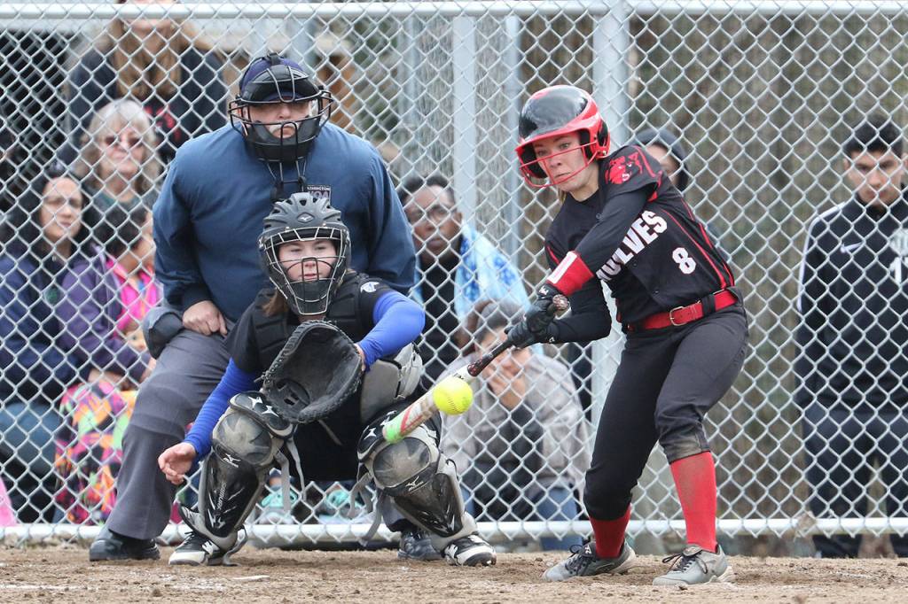 Lauren Rose, hitting, was named to the conferences first team in softball all four years of her CHS career.(Photo by John Fisken)