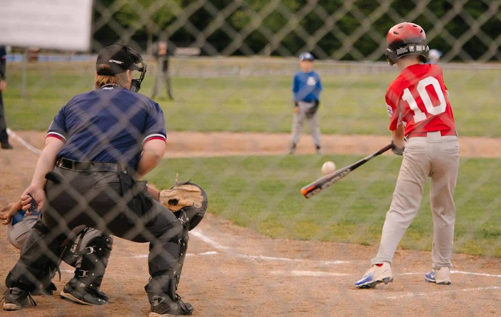 Oliver Halligan lines a base hit for the Angels.(Submitted photo)