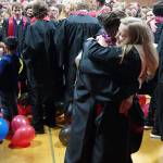 Photo by Maria Matson/Whidbey News-Times                                Coupeville senior McKenzie Meyer receives a hug from her fellow graduate. For the story about Coupevilles graduation Friday, turn to page A2 of todays Whidbey News-Times.