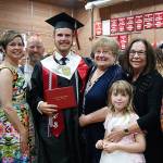 Photos by Maria Matson/Whidbey News-Times                                Luke Carlson, 19, stands with his family. He plans to attend Washington State University to pursue a degree in agricultural education.