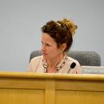Planning Commission member Shannon Williams listens during a planning commission meeting Monday. At the meeting, she said People who want to be here will work for it during a discussion about the goals of the housing element of the comprehensive plan. The timeline of the almost-complete element shifted significantly because of her and other members concerns. Photo by Laura Guido/Whidbey News Group