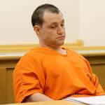 Photo by Jessie Stensland / Whidbey News Group.                                Convicted murderer Joshua Lambert appears bored during a hearing last Friday on a series of his motions. He is acting as his own attorney.