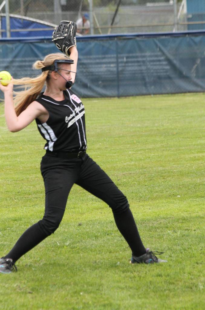 Left fielder Cypress Socha throws the ball to second base after a South Skagit hit.(Photo by Jim Waller/Whidbey News-Times)