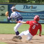 Coupevilles Jake Hoagland slides into second base with a double as Chase Ogden awaits the throw.(Photo by Jim Waller/Whidbey News-Times)