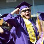 Photo by Laura Guido/Whidbey News-Times.                                Donovan McCulley cheers at the end of the commencement ceremony Saturday.