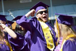 Photo by Laura Guido/Whidbey News-Times.                                Donovan McCulley cheers at the end of the commencement ceremony Saturday.