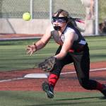 Central Whidbey third baseman Madison McMillan hustles in to grab a pop-up.(Photo by John Fisken)