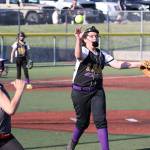 North Whidbey pitcher Katie Cantrell tosses to first base for an out.(Photo by John Fisken)