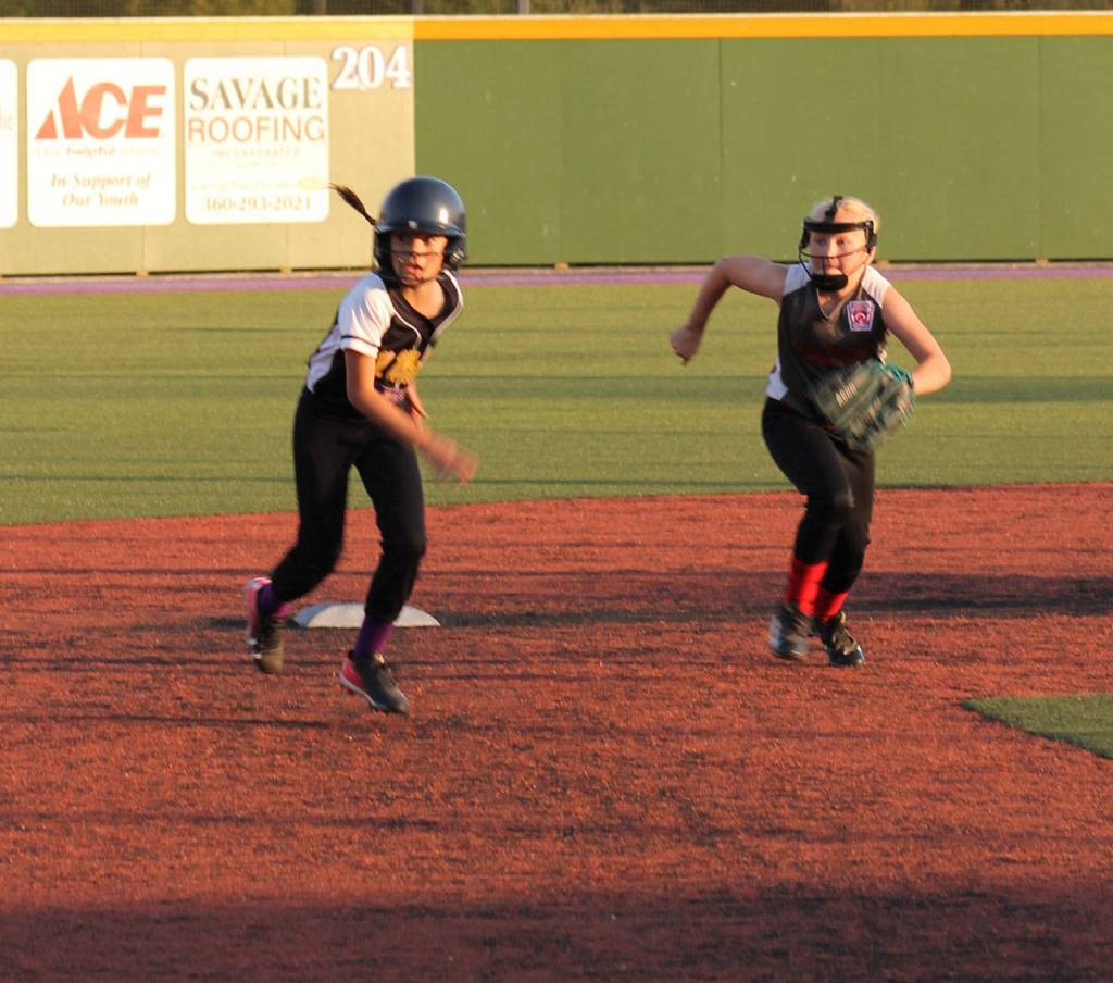 North Whidbeys Adyson Morales (runner) and Central Whidbeys Taylor Brotemarkle.(Submitted photo)