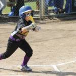 Roland Garrett puts down a bunt for a base hit against Sedro-Woolley Saturday.(Photo by Jim Waller/Whidbey News-Times)
