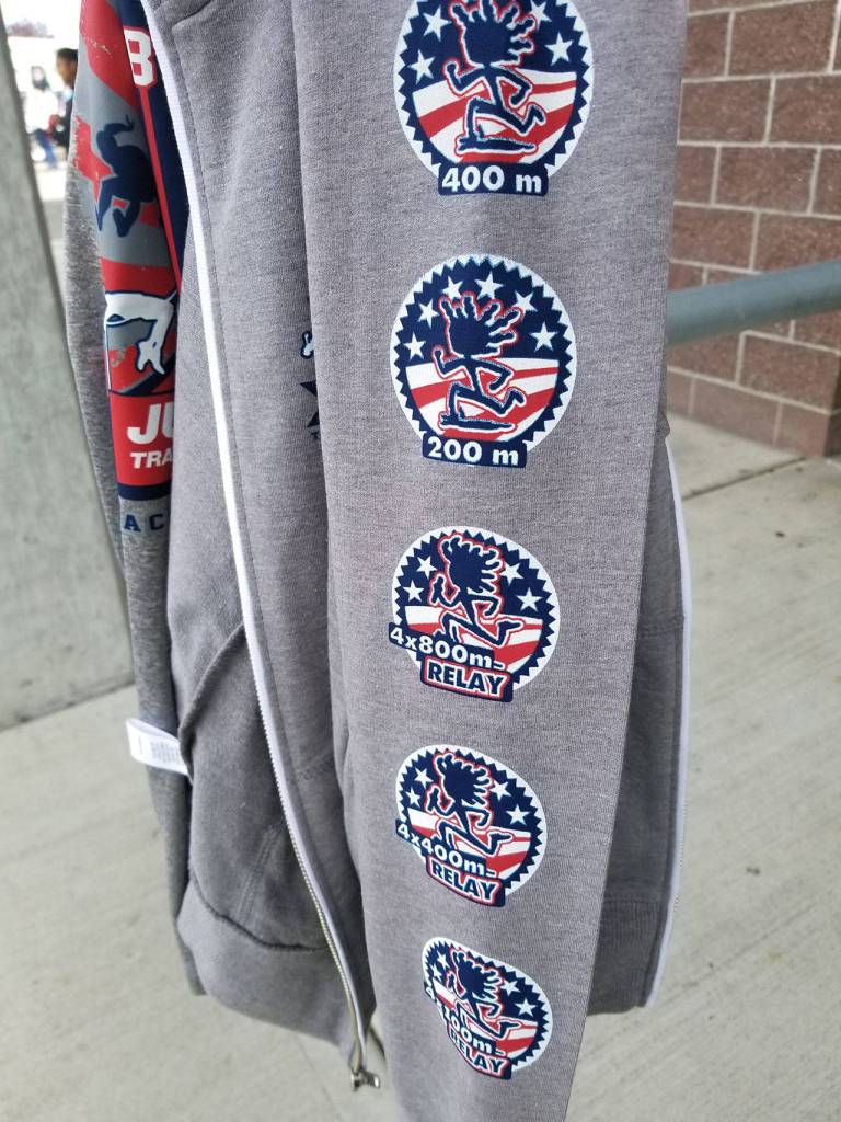 Patches on Danny Conlisks shirt display the events he qualified to compete in at the regional Junior Olympic meet. (Photo courtesy of Dawnelle Conlisk)
