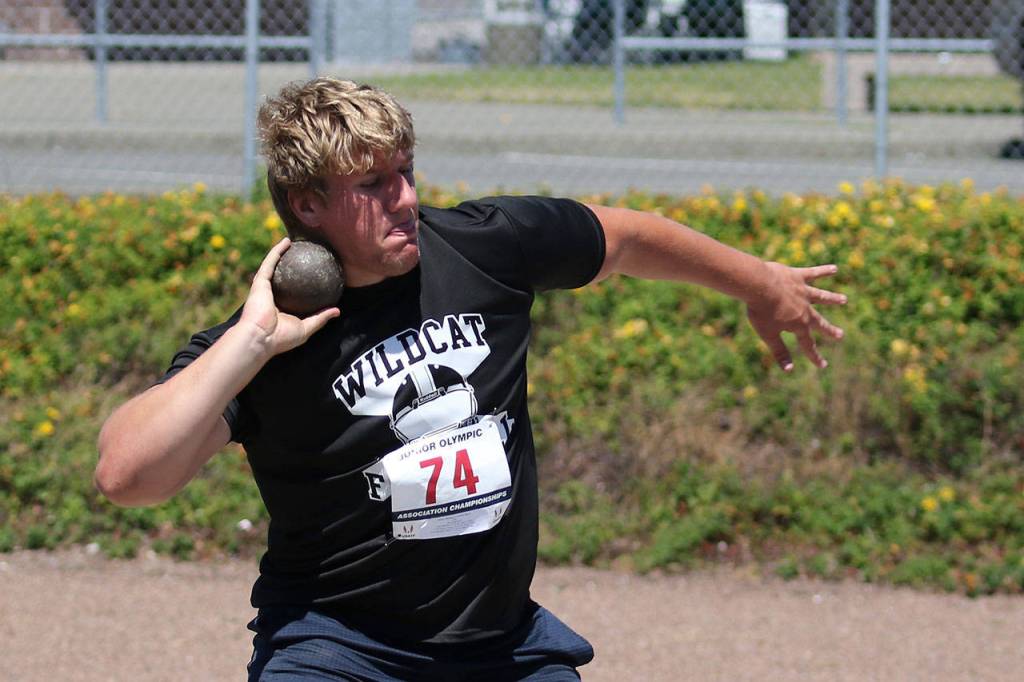 Michael Fisken tosses the shot put at the Pacific Northwest Championships this weekend.(Photo by John Fisken)