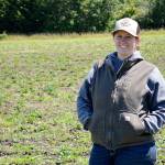 Paige Mueller-Flack stands in a new strawberry field at Bells Farm. The farms acclaimed June bearing and everbearing strawberries will be available for u-pick and featured in homemade baked goods for sale at Strawberry Daze, starting at 10 a.m. Saturday at Bells Farm, 892 West Beach Road, Coupeville. The second annual festival will include tours, food trucks, music and childrens activities. Photo by Laura Guido/Whidbey News-Times