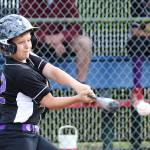 Connor Cash puts the ball in play for North Whidbey Monday. (Photo by John Fisken)