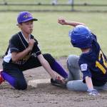 North Whidbey shortstop Holden Jesus puts the tag on a Burlington-Edison runner in Mondays game.(Photo by John Fisken)