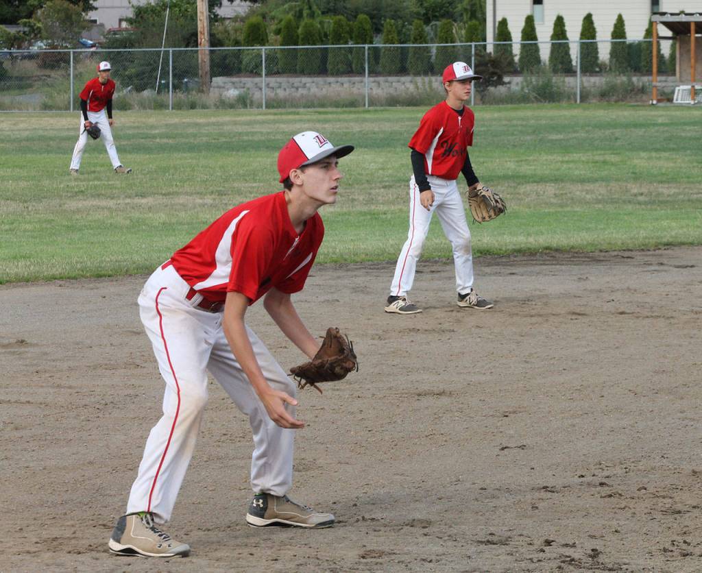 The left side of the Coupeville defense gets ready to make a play. (Photo by Jim Waller/Whidbey News-Times)