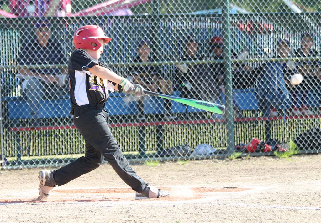 Christian Gisvold laces a triple to lead off the bottom of the first inning.(Photo by Jim Waller/Whidbey News-Times)