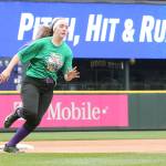 Katie Bishop races around third base during the Pitch, Hit and Run contest Sunday. (Photo by John Fisken)