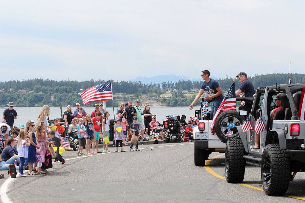 Photos by Jessie Stensland / Whidbey News-Times                                Hundreds of people lined the streets in downtown Oak Harbor to watch the annual Fourth of July Parade.
