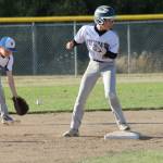 Aiden Golden steals second base as the Sedro-Woolley fielder is late covering the bag. (Photo by Jim Waller/Whidbey News-Times)