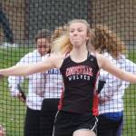 Coupevilles Allison Wenzel, who earned varsity letters in three sports this school year, wrapped up her athletic career by placing ninth in the state in the discus. (Photo by John Fisken)