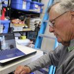 Bill Haroldson, president of the South Whidbey Historical Society, has turned detective in pursuit of the story behind the story pole. Photo by Patricia Guthrie/Whidbey News Group