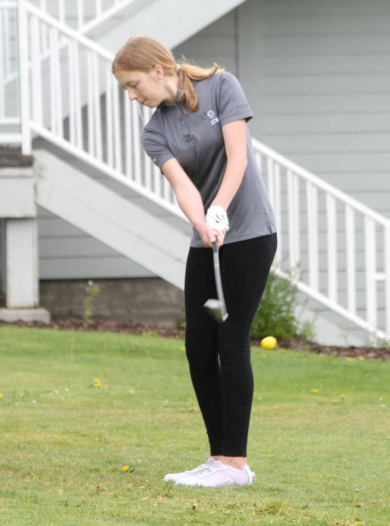 Jasmine Evans works on her chipping.(Photo by Jim Waller/Whidbey News-Times)