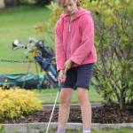 Payton Wallin lines up a putt.(Photo by Jim Waller/Whidbey News-Times)