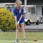 Scarlett Nations gets ready to putt Thursday at camp.(Photo by Jim Waller/Whidbey News-Times)