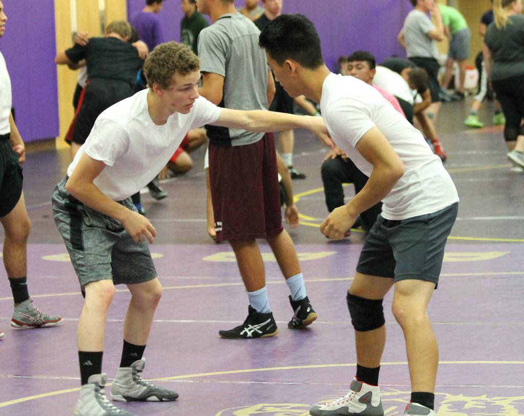 Oak Harbors Shamus Warden, left, and Jakob Dailey square off in a drill.(Photo by Jim Waller/Whidbey News-Times)