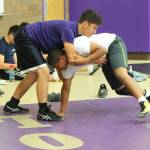 Zach Badaouie, left, and Noah Hangan pair-up to work on technique. (Photo by Jim Waller/Whidbey News-Times)