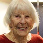 Photo by Maria Matson / Whidbey News Group.                                Jean Sherman stands with her 100th birthday bouquet.
