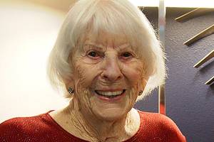Photo by Maria Matson / Whidbey News Group.                                Jean Sherman stands with her 100th birthday bouquet.