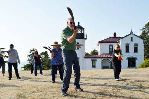 For t’ai chi class, yielding sabers all about better balance