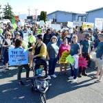 Around 120 Oak Harbor Education Association members gathered Tuesday morning in front of the Midway Training Facility, the sight of bargaining negotiations. Union members said Tuesdays crowd had double the number of a similar rally last year. Photo by Laura Guido/Whidbey News-Times