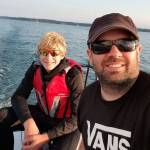 Crewman Ryan Nowicki, right, takes a selfie with Vertigo skipper Thomas Buys.