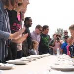 Hungry pie-eating competitors of all ages during a the tense moment before the race began. Photo by Emily Gilbert/Whidbey News-Times