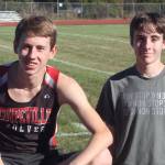 Henry Wynn, left, and Danny Conlisk take a break during a cross country workout in 2016. The pair ignited a renewed interested in the sport at Coupeville High School. (Photo by Jim Waller/Whidbey News-Times)