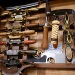 Brian Noel of Oak Harbor started making his own woodworking tools by happy accident. The tools stacked, left, are used to make wooden spokes on a wagon wheel. Photo by Emily Gilbert/Whidbey News-Times.