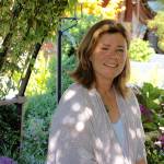 Photos by Joan Soltys                                <em>Maureen Murphy in the Laburnum Arbor, one of her favorite spots at Bayview Farm and Garden.</em><em></em>