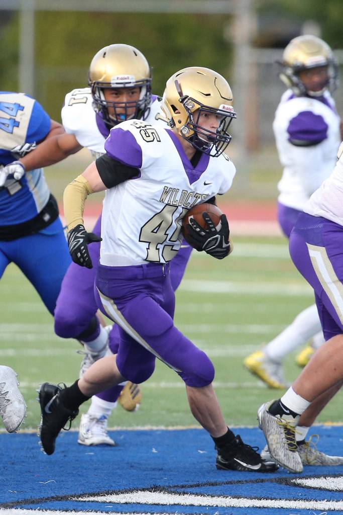Caden Leckelt looks for some running room.(Photo by John Fisken)