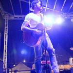 Backup vocalist and guitarist Taylor Abram of James Barker Band performs Saturday night. Photo by Laura Guido/Whidbey News-Times