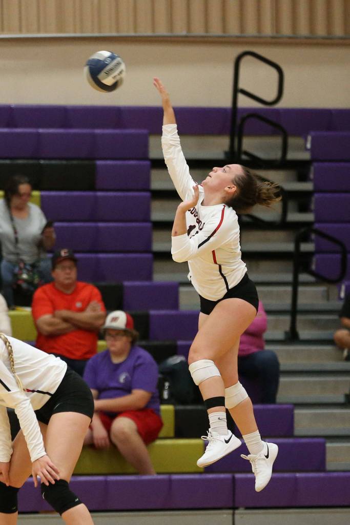 Ashley Menges blasts a serve for Coupeville.(Photo by John Fisken)